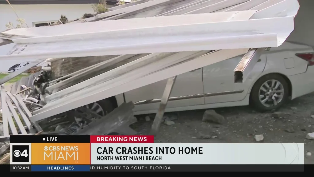 Security camera video shows car crashing into Miami-Dade home