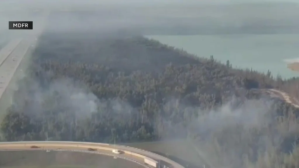 Miami-Dade fire crews continue to fight fires burning over 20,000 acres
