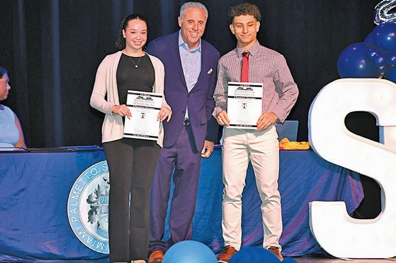 Law firm awards scholarships to two Palmetto HS students