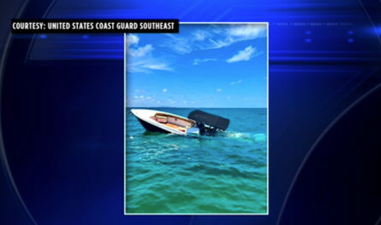 U.S. Coast Guard rescues boaters from a sinking boat; no injuries reported