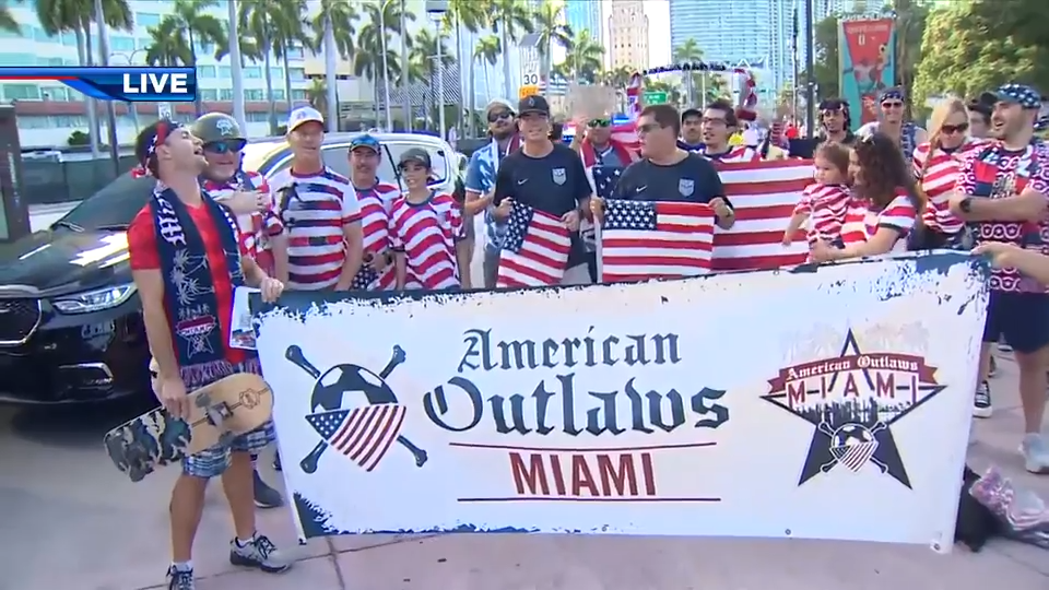 American Outlaws Miami members march to Fan Fest to cheer on Team USA in match against Turkey