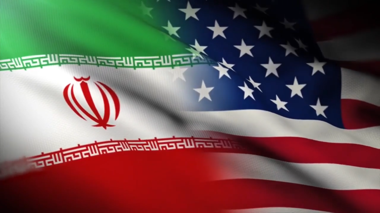 Iran says it is suspending commitments to interim deal with US as the two exchange attacks