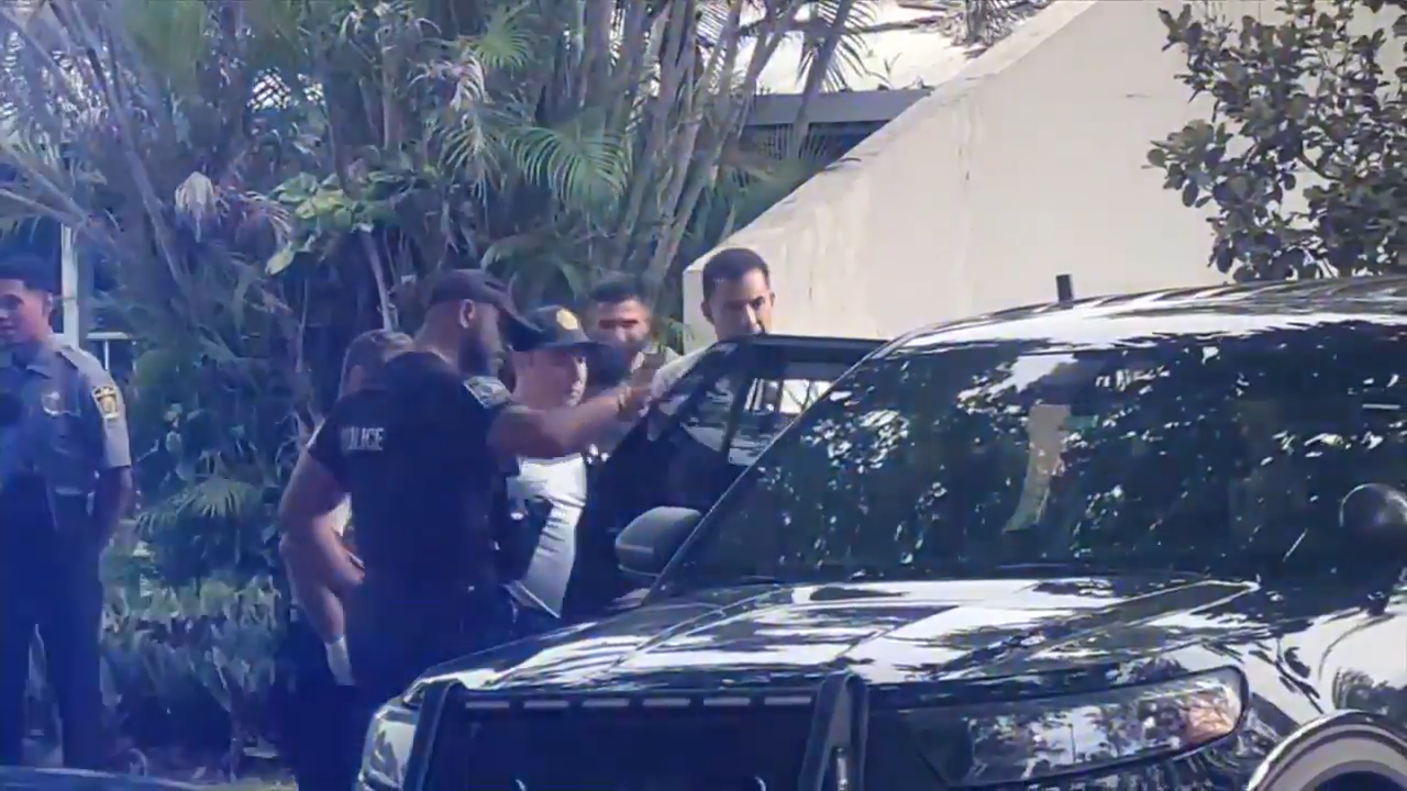 Witnesses speak out after police pursuit ends with man jumping into lake before being apprehended in Miami Lakes