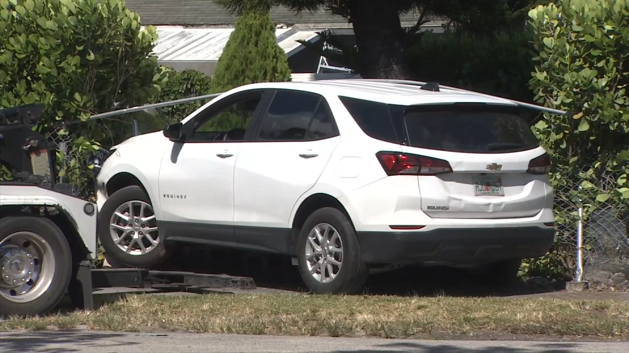 Car crashes into fence in NW Miami-Dade; no injuries reported, cause unknown